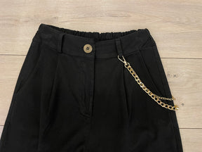 PANTALONI OVETTO CON CATENA